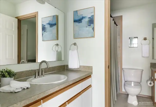 Pass through bathroom.