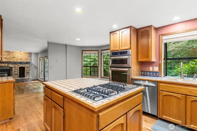 Island kitchen with gas downdraft cooktop