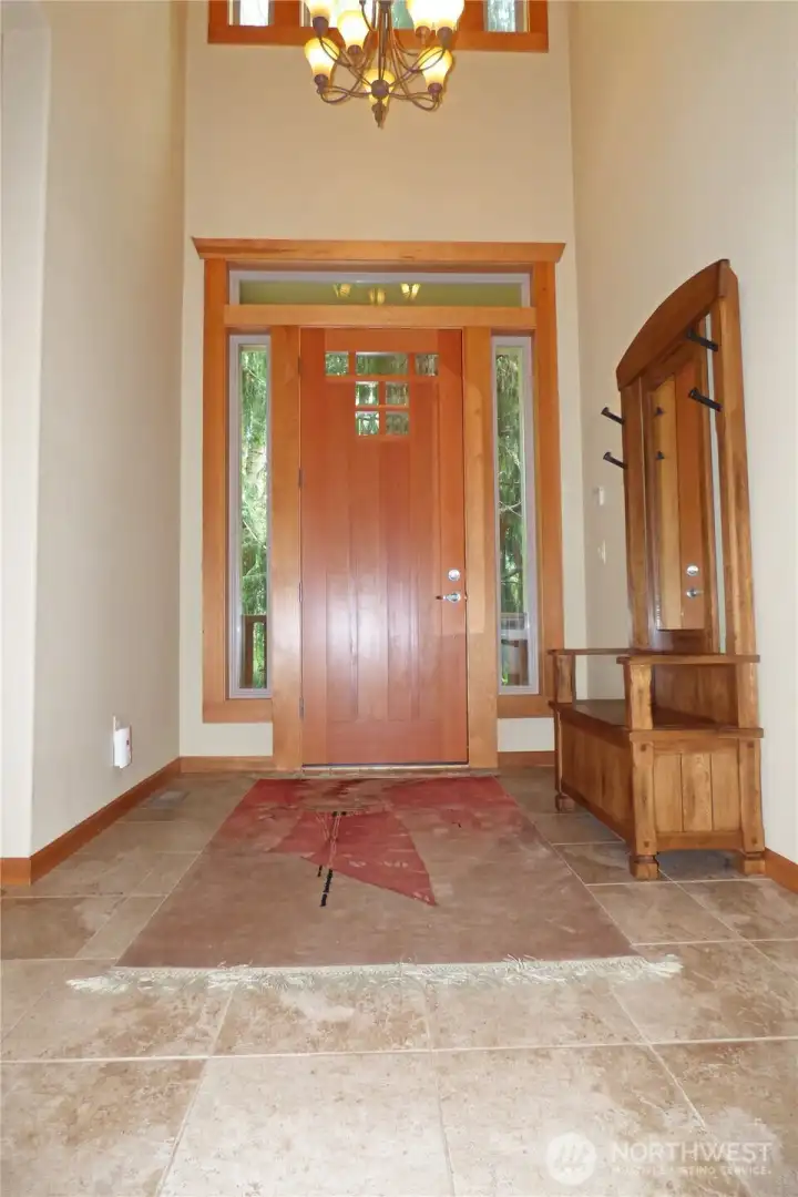 Welcome! Enter through this grand entry to your new house with solid wood doors, wood wrapped windows and sooooo much more.