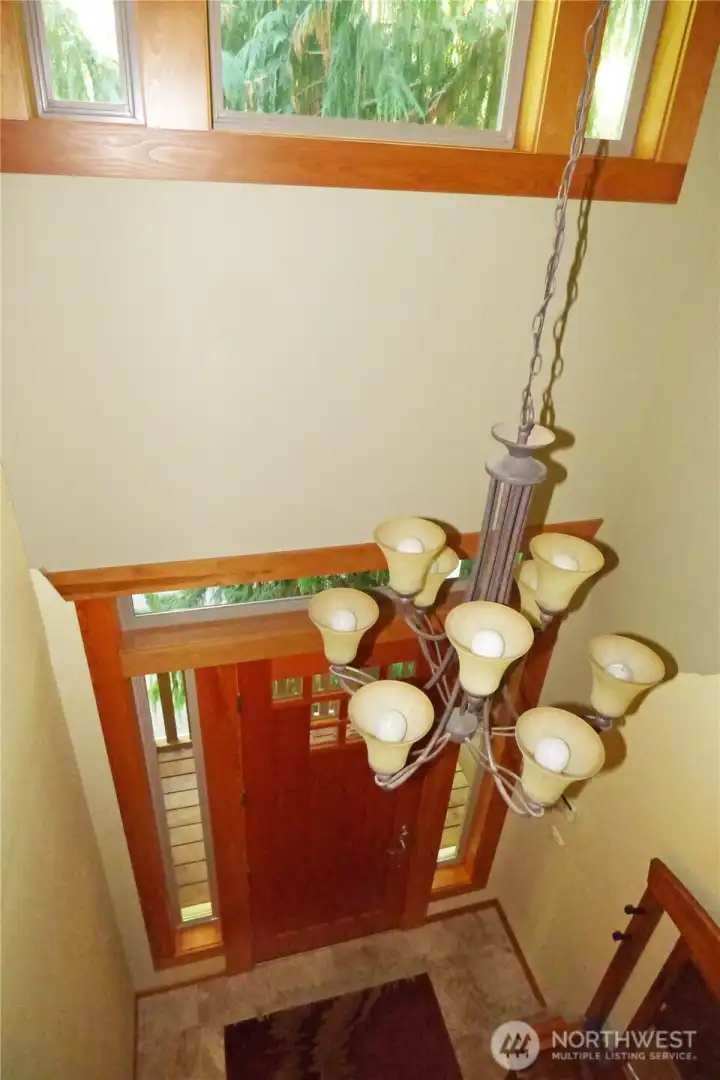 Looking down to the front door from the landing.
