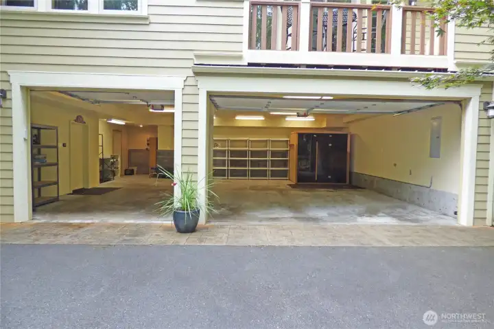 Large, finished 3 car garage (924 sq ft) with garage door openers. Note all the extra room for another car, shop, ???