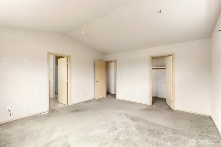 Door to left is ensuite,  door to right is walk in closet and of course the middle door accesses the hallway.