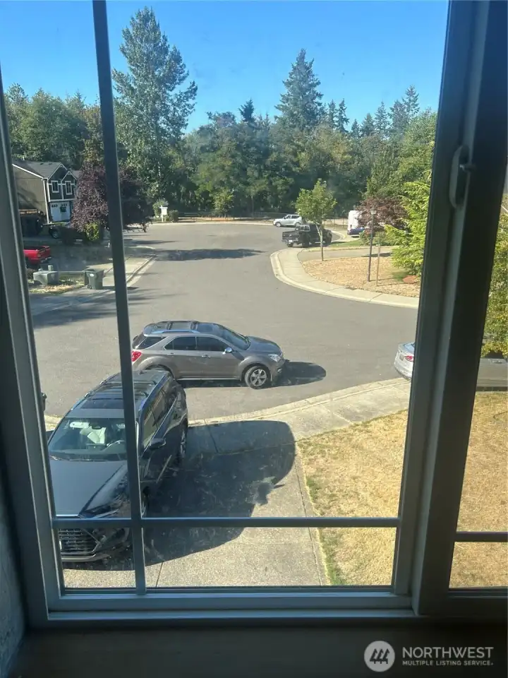 View of the cul de sac from bedroom 2.  Neighborhood playground at the end.