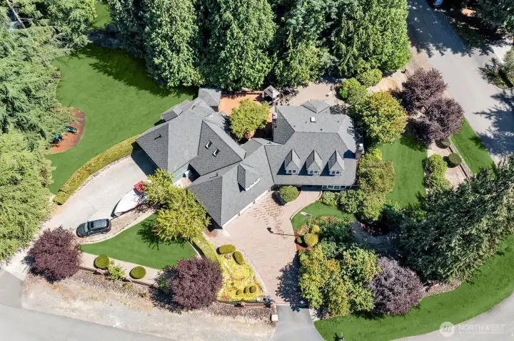 Property is fully fenced and gated. Car enthusiasts & hobbyists will love the expansive garage capacity-space for up to 7 cars. 2nd garage has RV doors & car lift & fully equiped gym.