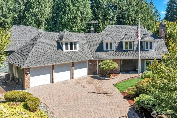 Main house has 3-car garage with new garage doors. The garage has