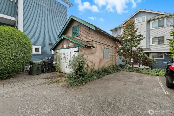 Garage and parking behind building.