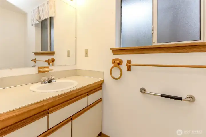 This is the half bath in between the kitchen and laundry room.
