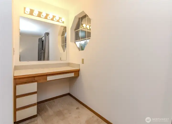 Plenty of light here for getting ready for the day and keeping clutter off the bathroom counter.