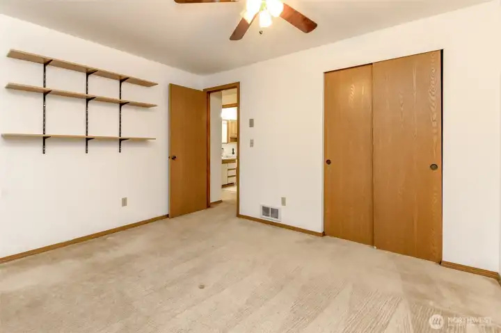 Front of the house extra bedroom with shelving.