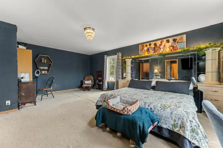 Primary Suite with extra seating area for hobbies or relaxation