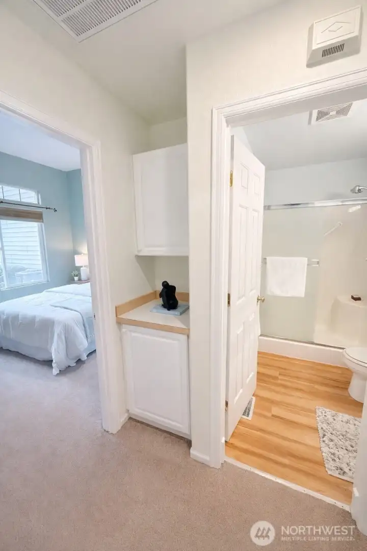 view of second bedroom and 2nd bath