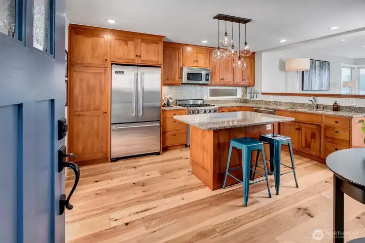 Enter into stunning kitchen open to main living.