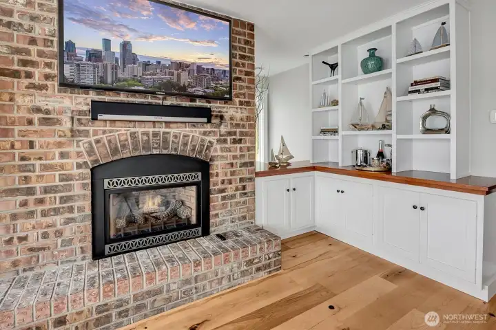 Custom built-in's flank the fireplace