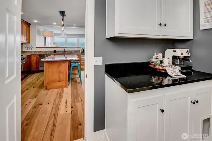 Coffee bar and extra storage adjacent to kitchen