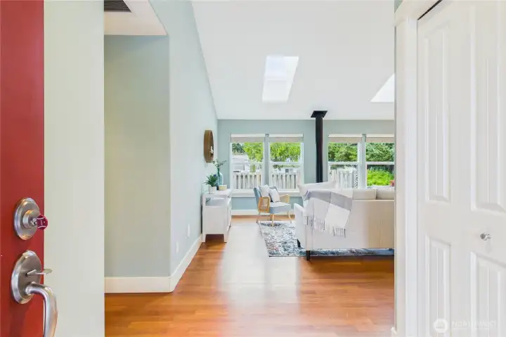 Welcomed by light and airy living room.