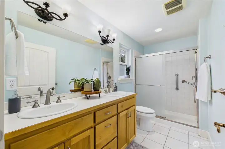 Primary bathroom with grab bar in the shower