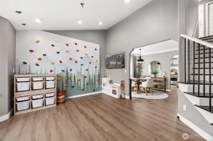 Step inside to an inviting entry with NEW vinyl planked floors, vaulted ceilings, & arched doorways. The rock wall can either stay or go - seller will repair the wall once removed.