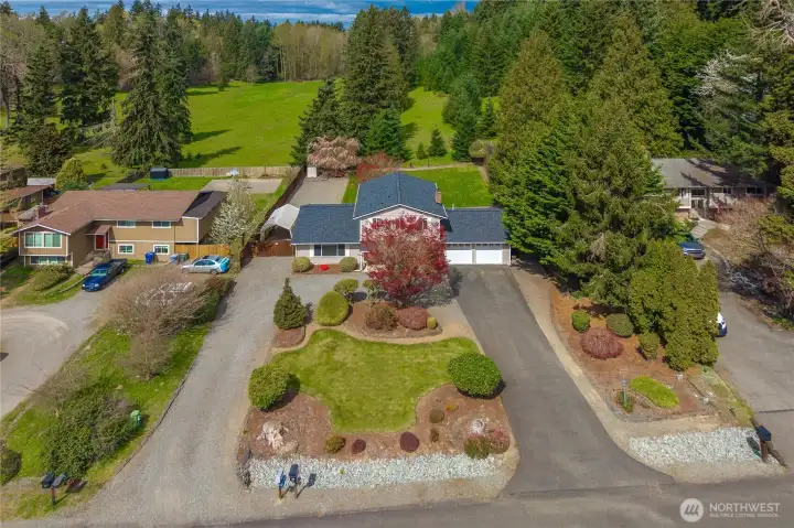 Round about Driveway and Lush landscaping