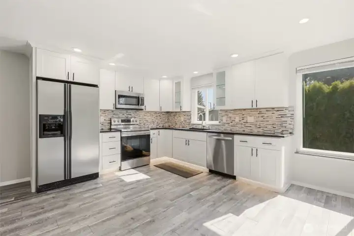 Completly updated Kitchen and eating area with quartz and under cabinet lighting