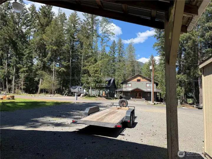 From Carport facing North across Butter Creek Ln. Note Butter Peak in the Tatoosh Wilderness, visible through the trees.