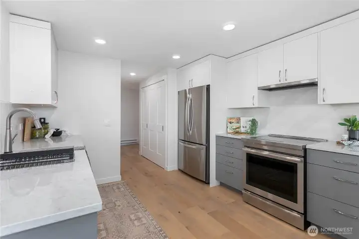 Double oven with induction stove top.