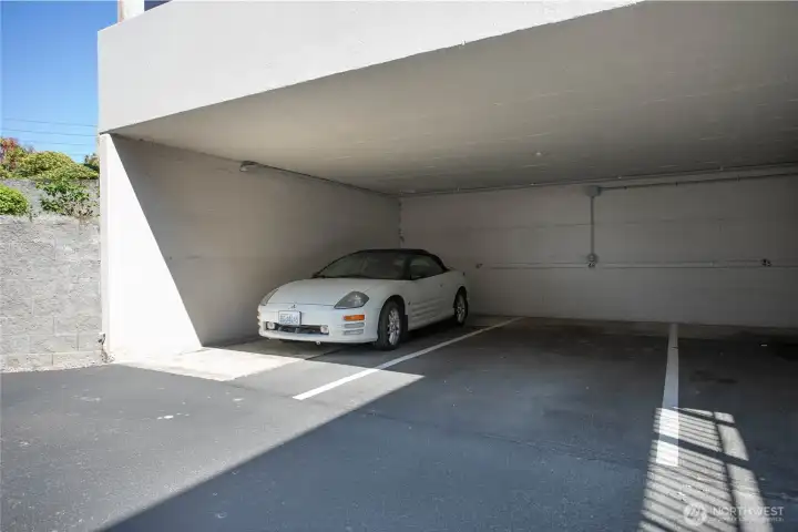 Reserved carport parking space with dedicated electrical outlet