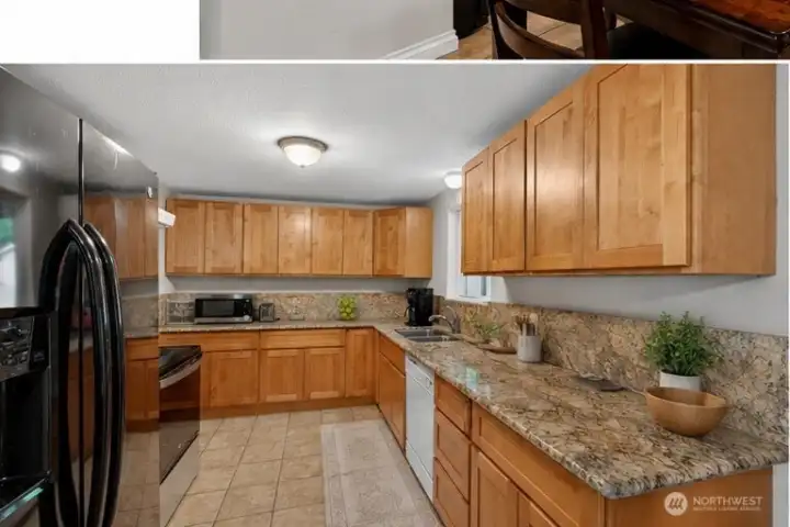 Bright and welcoming, this spacious kitchen features extensive counter space, ample cabinetry, and an open connection to the dining area and outdoor entertaining spaces. Natural light from the window above the sink enhances the inviting atmosphere, while the thoughtful layout supports both convenience and practicality.