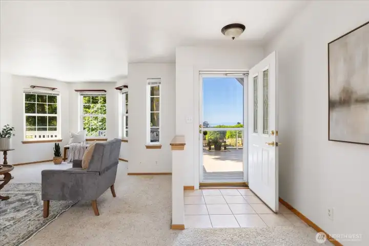The spacious living room is ready for morning coffee and relaxing with a book.