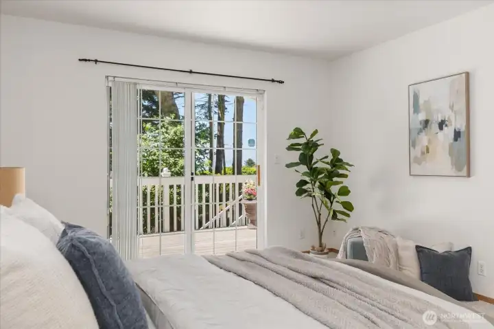 Sliding glass doors lead out to separate deck for morning coffee.