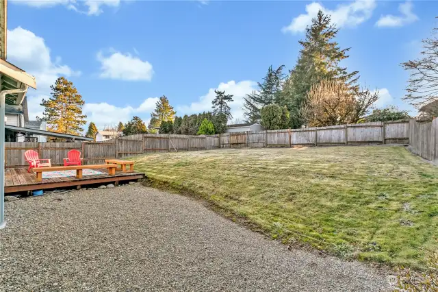 And check out this large flat yard with mature landscaping offering loads of privacy...