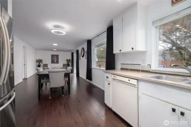 Kitchen looking into Dining Room and Family Room