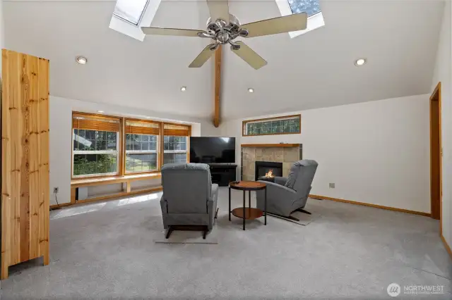 The VERY large Family Room, or convert it to an apartment if you want.  Since the laundry is so close, plumbing is easy peasy.