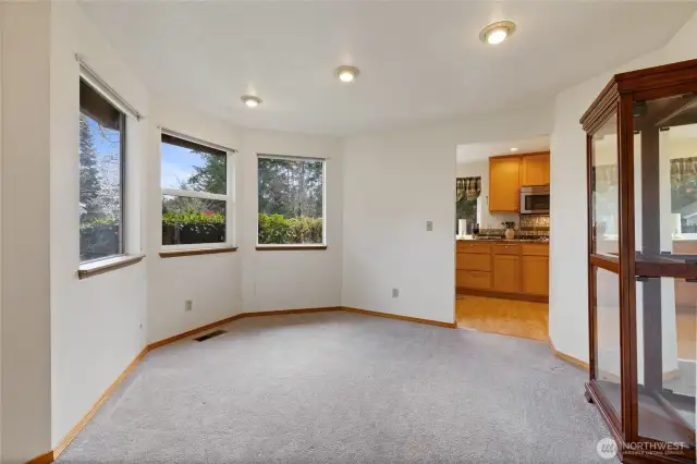 Formal Dining Room with a nice curve allows for any shape table.