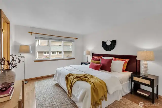 Upstairs Primary Bedroom. Not 1-inch of carpet in this house!