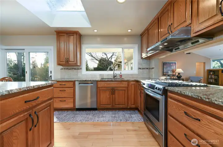 A truly unique kitchen designed for culinary creativity, featuring generous counter space, ample cabinetry, and abundant storage. This inspiring space has been the heart of catering for numerous parties, weddings, and fundraising events.