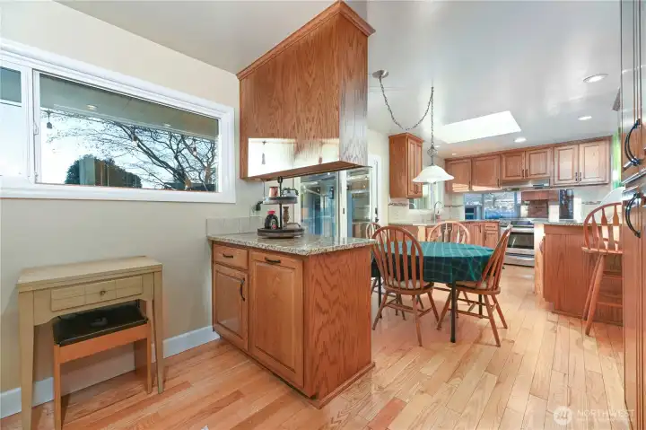 A truly unique kitchen designed for culinary creativity, featuring generous counter space, ample cabinetry, and abundant storage. This inspiring space has been the heart of catering for numerous parties, weddings, and fundraising events.