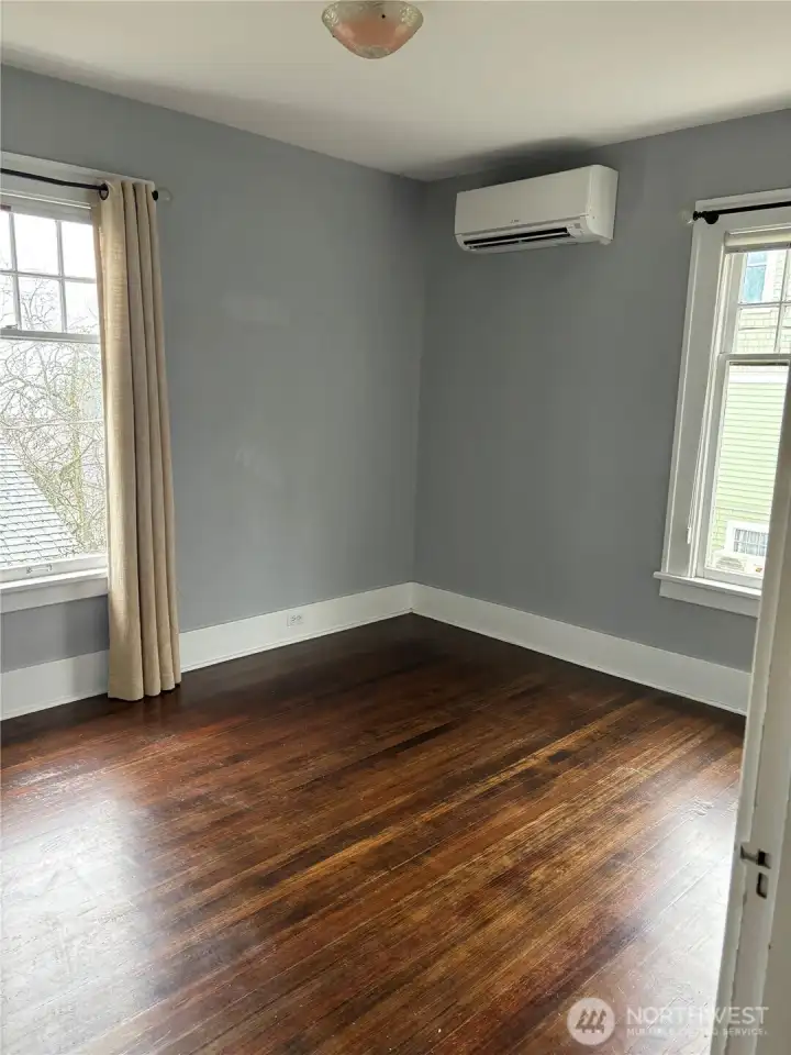 Upper bedroom with AC split.