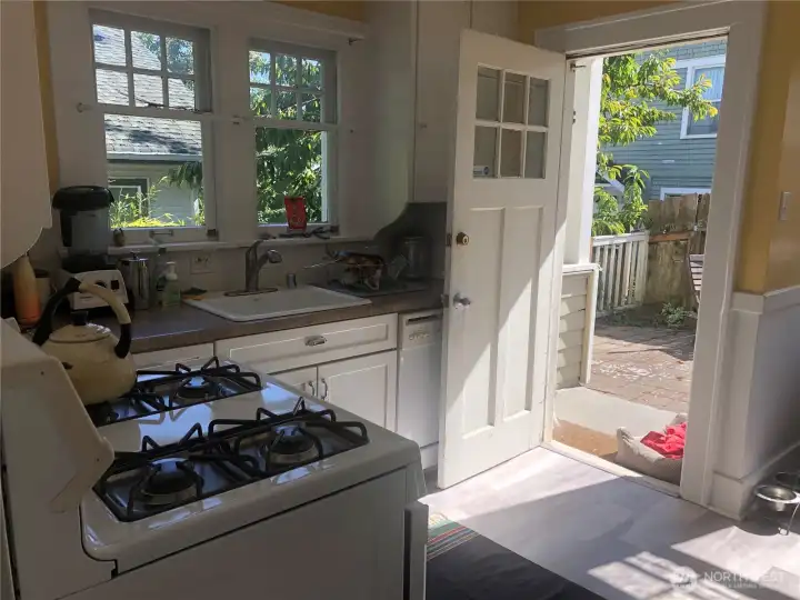 Lower kitchen has easy access to private garden for entertaining, BBQing and morning coffees.