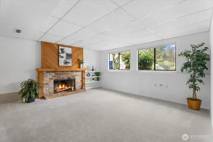 Downstairs offers a generous family room with a wet bar.