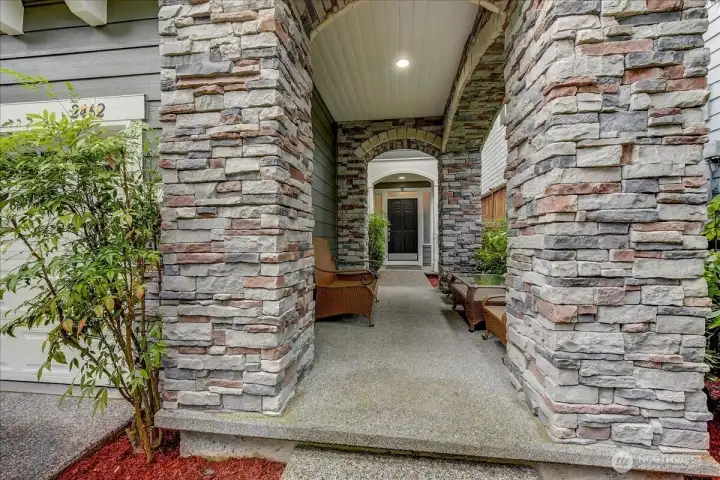 Grand entry with covered seating area