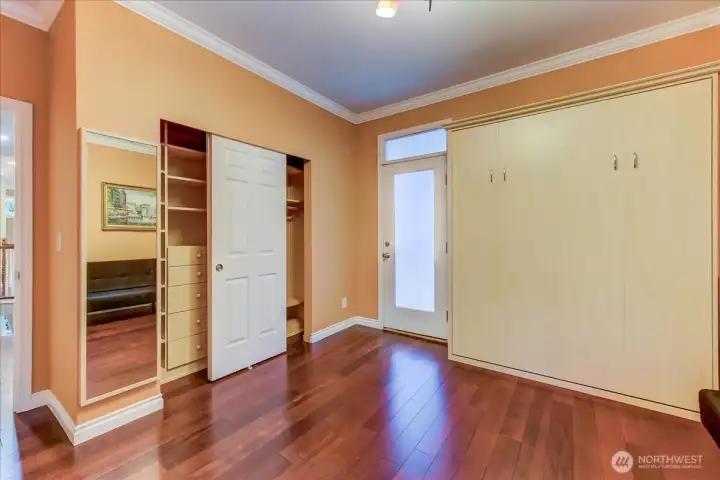 Bedroom 3 California Closet and door to deck