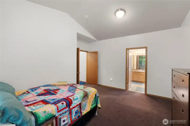 Large primary suite offering ample space for furnishings and a relaxing retreat.