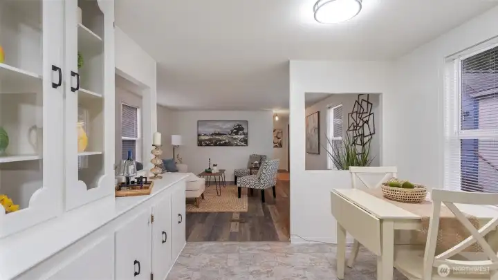 The two cutouts in the dining area creates an open and spacious feeling throughout the home