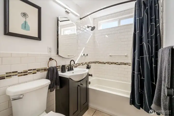 Shared bathroom on lower level.