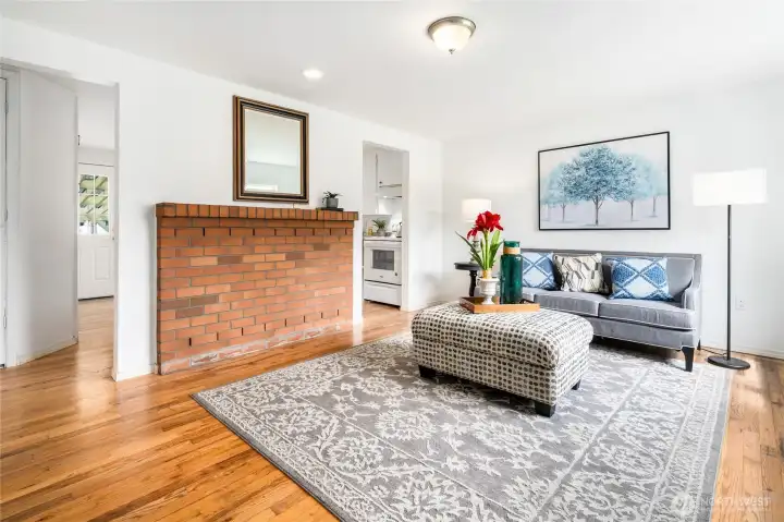 Spacious Living Room with original hardwood flooring