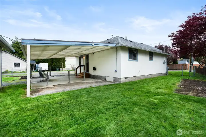 Lovely grounds showing Carport
