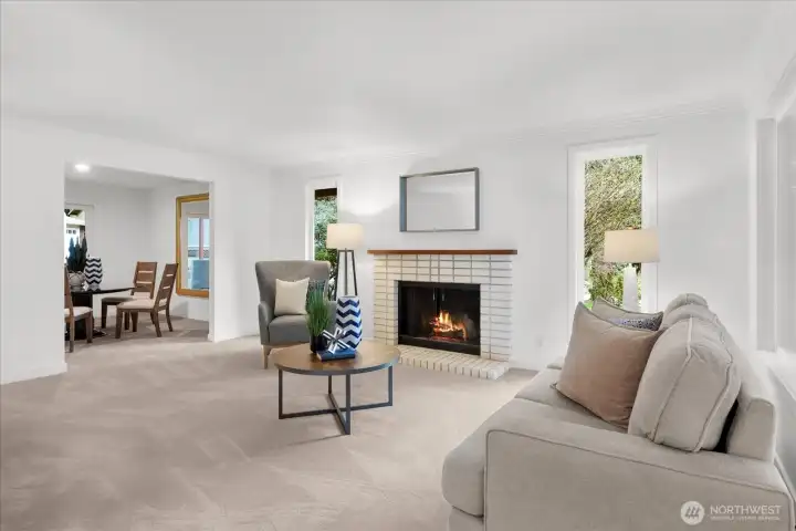 Formal Living Room w/ wood burning fireplace.
