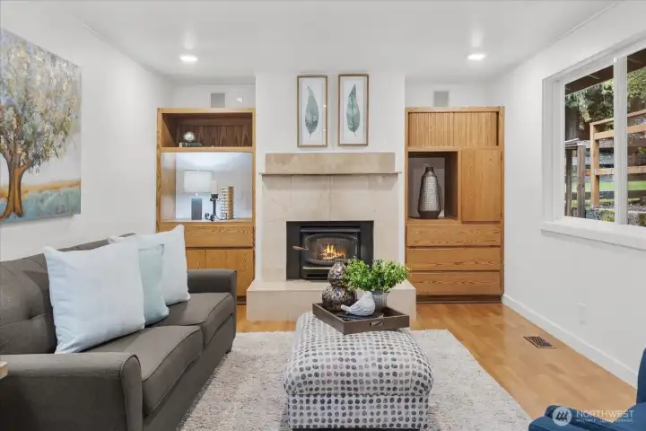 Spacious family w/ wood burning fireplace and built-in cabinets.