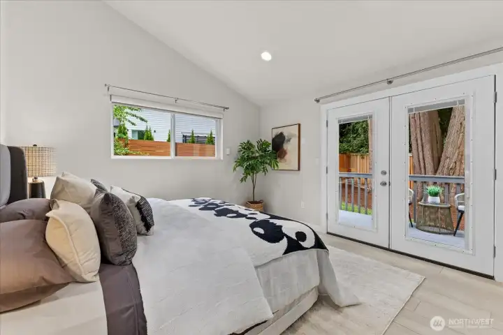 Primary suite with French door out to the new text deck