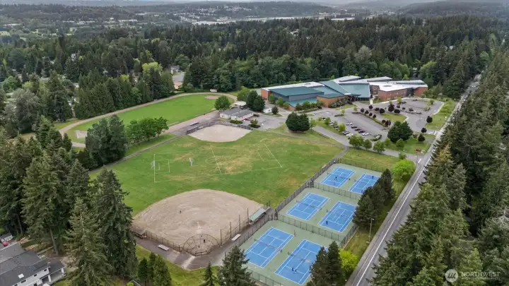 Walk across the street to play tennis/pickle ball or basement in the field across the street from Redmond Middle.